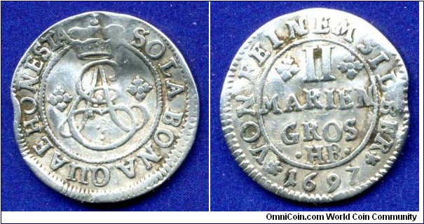 2 mariengroschen.
Braunschweig-Calenberg-Hannover.
Ernst August (1679-1698).
*HB* - Clausthal mint, mintmaster Henrich Bonhorch, work in 1675-17121.


Bilon.