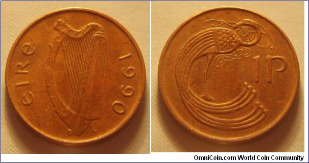 Ireland | 
1 Pingin, 1990 | 
20.32 mm, 3.56 gr. | 
Copper plated Steel | 

Obverse: Irish harp (Cláirseach), date right|
Lettering: éire 1990 | 

Reverse: Stylized bird adapted from an ornamental detail in the 