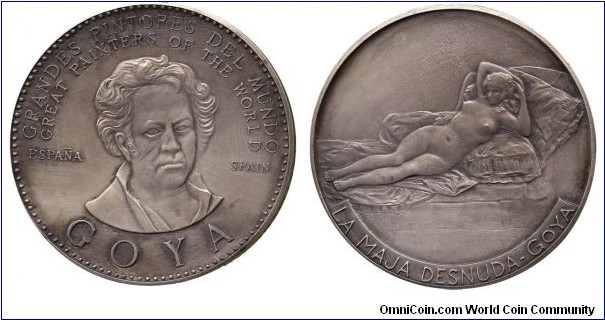 1964 Spain Goya Medal by the Staatliche Munze, Karlsruhe. Silver 49.5MM./69.73 gms. #709
Obv: Bust of Goya face slightly right. Legend GOYA GRANDES PINTORES DEL MUNDO, GREAT PAINTERS OF THE WORLD, ESPANA.SPAIN. Rev: Picture of Maja with legend LA MAJA DESNUDA.GOYA.

