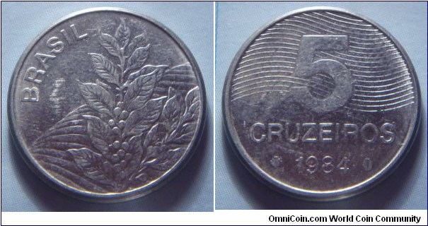 Brazil | 
5 Cruzeiros novo, 1984 | 
21.8 mm, 4.48 gr. | 
Stainless Steel | 

Obverse: Coffee plant | 
Lettering: BRASIL | 

Reverse: Ribbon behind denomination, date below | 
Lettering: 5 CRUZEIROS 1984 |