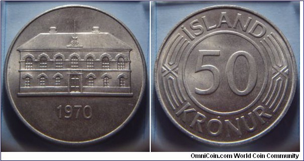 Iceland | 
50 Krónur, 1970 | 
30 mm, 12.6 gr. | 
Copper-nickel | 

Obverse: The Icelandic Parliament building, date below |
Lettering: 1970 | 

Reverse: Denomination | 
Lettering: ÍSLAND 50 KRÓNUR |