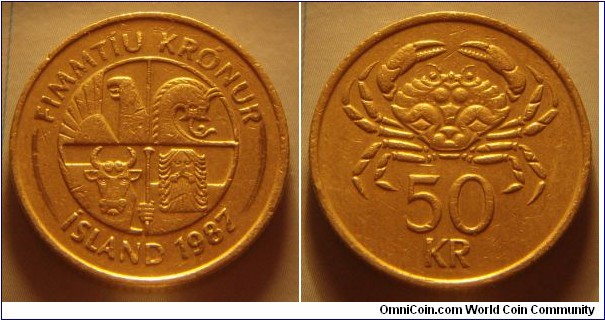 Iceland | 
50 Krónur, 1987 | 
23 mm, 8.25 gr. | 
Nickel-brass | 

Obverse: Square with the four guardian spirits, or 