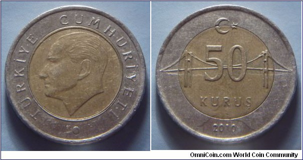 Turkey | 
50 Kuruş, 2010 | 
23.85 mm, 6.8 gr. | 
Bi-metallic: Brass centre in Copper-nickel ring | 

Obverse: Mustafa Kemal Atatürk facing left | 
Lettering: TÜRKİYE CUMHURİYETİ • | 

Reverse: Bosphorus Bridge linking Europe with Asia, denomination below, date bottom | 
Lettering: 50 KURUŞ 2010 |