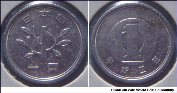 Japan | 
1 Yen, 1990 | 
20 mm, 1 gr. | 
Aluminium | 

Obverse: Sapling, denomination below | 
Lettering: 日本国 一円 | 

Reverse: Denomination, date below | 
Lettering: 1 平成二年 |
