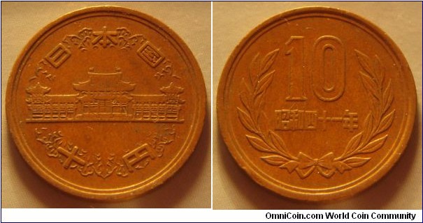 Japan | 
10 Yen, 1966 | 
23.5 mm, 4.5 gr. | 
Bronze | 

Obverse: Temple, denomination below | 
Lettering: 日本国 十円 | 

Reverse: Denomination within wreath, date below | 
Lettering: 10 昭和四十一年 |