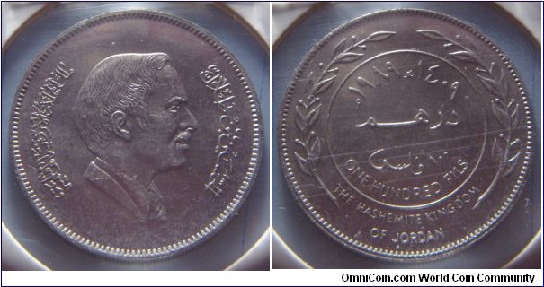 Jordan | 
100 Fils, 1989 (1409) | 
30 mm, 12 gr. | 
Copper-nickel | 

Obverse: King Hussein II Ibn Talal facing right | 
Lettering: الحسين بن طلال ملك المملكة الأردنية الهاشمية | 

Reverse: Denomination, date above | 
Lettering: ١٣٩٨م ١٩٧٨ھ درهم ١٠٠ فلس ONE HUNDRED FILS THE HASHEMITE KINGDOM OF JORDAN |