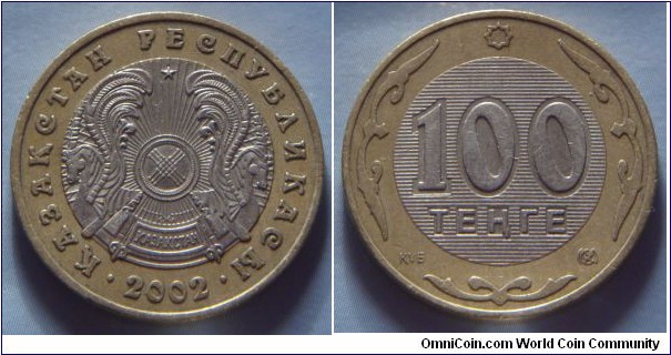 Kazakhstan | 
100 Teñge, 2002 | 
24.4 mm, 6.23 gr. | 
Bi-metallic: Copper-nickel centre in Nickel-brass ring | 

Obverse: National coat of Arms, date below| 
Lettering: • ҚАЗАҚСТАН РЕСПУБЛИКАСЫ • 2002 | 

Reverse: Denomination | 
Lettering: 100 ТЕҢГЕ ҚҰБ |