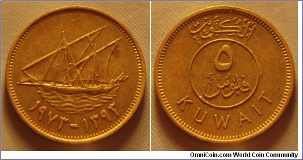 Kuwait | 
5 Fils, 1973 (1393) | 
19.5 mm, 2.5 gr. | 
Nickel-brass | 

Obverse: Arab Dhow with sails, date below | 
Lettering: ١٩٧٣ - ١٣٩٣ | 

Reverse:  Denomination | 
Lettering: الكويتي ٥ فلوس KUWAIT |