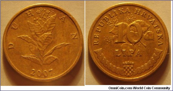 Croatia | 
10 Lipa, 2007 | 
20 mm, 3.25 gr. | 
Brass plated Steel | 

Obverse: Tobacco plant, date below | 
Lettering: DUHAN 2007. | 

Reverse:  Denomination on flowering linden, National Coat of Arms bottom | 
Lettering: REPUBLIKA HRVATSKA 10 LIPA |
