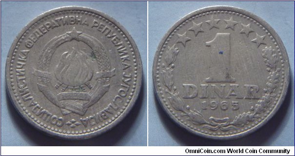 Yugoslavia | 
1 Hard Dinar, 1965 | 
21.8 mm, 3.9 gr. | 
Copper-nickel | 

Obverse: National Coat of Arms | 
Lettering: СОЦИJАЛИСТИЧКА ФЕДЕРАТИВНА РЕПУБЛИКА JУГОСЛАВИJА | 

Reverse: Denomination within wreath, date below | 
Lettering: 1 DINAR 1965 |