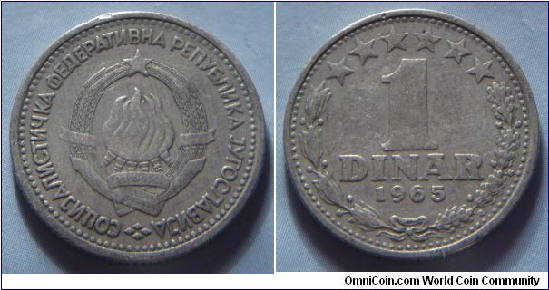 Yugoslavia | 
1 Hard Dinar, 1965 | 
21.8 mm, 3.9 gr. | 
Copper-nickel | 

Obverse: National Coat of Arms | 
Lettering: СОЦИJАЛИСТИЧКА ФЕДЕРАТИВНА РЕПУБЛИКА JУГОСЛАВИJА | 

Reverse: Denomination within wreath, date below | 
Lettering: 1 DINAR 1965 |