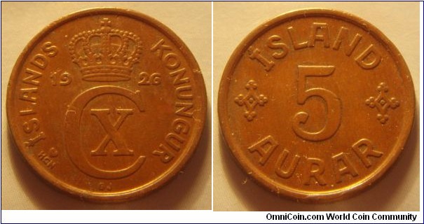 Iceland | 
5 Aurar, 1926 | 
24 mm, 6.02 gr. | 
Bronze | 

Obverse: Crowned monogram divides date | 
Lettering: ÍSLANDS KONUNGUR 1926 CX |

Reverse: Denomination | 
Lettering: ÍSLAND 5 AURAR |