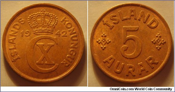 Iceland | 
5 Aurar, 1942 | 
24 mm, 6.02 gr. | 
Bronze | 

Obverse: Crowned monogram divides date | 
Lettering: ÍSLANDS KONUNGUR 1942 CX |

Reverse: Denomination | 
Lettering: ÍSLAND 5 AURAR |