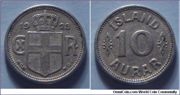 Iceland | 
10 Aurar, 1923 | 
14.7 mm, 1.48 gr. | 
Copper-nickel | 

Obverse: Crowned Coat of arms divides monogram date | 
Lettering: 1923 CX R• |

Reverse: Denomination | 
Lettering: ÍSLAND 10 AURAR |