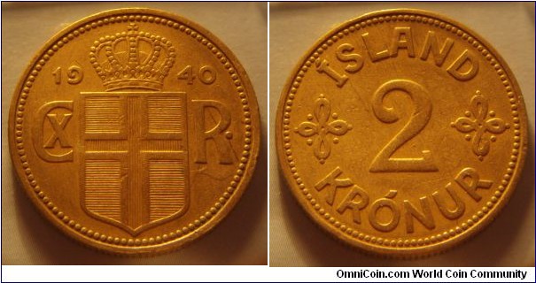 Iceland | 
2 Krónur, 1940 | 
27 mm, 9.53 gr. | 
Aluminium-bronze | 

Obverse: Crowned Coat of arms divides monogram date | 
Lettering: 1940 CX R• |

Reverse: Denomination | 
Lettering: ÍSLAND 2 KRÓNUR |