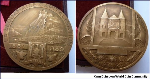 1889-1939 La Sequanaise Capitalisation Banque Assurance Medal. Bronze: 50MM./57 gms.
Obv: Scene of Franch Mountain with River in front & Castle on top. Legend LA SEQUANAISE CAPTALISATION. 1889 1939 between Coat of Arms VTINAM. Bee on both side. Rev: View of Castle with Horn of Planty on both sides.
