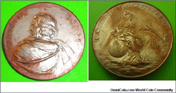 1892 Spainish Christopher Columbus 4th Centennial Discovery Medal by l. Chr. Lauer. Silver plated Bronze: 45.4MM. 
Obv: Rugged caped bust of Columbus to left. Legend CRISTOBAL COLON. Rev: Hispania seated on globe with scepter, gazing at Santa Maria at right. Legend RECUERDO DEL 4o CENTENARIO 1892.
