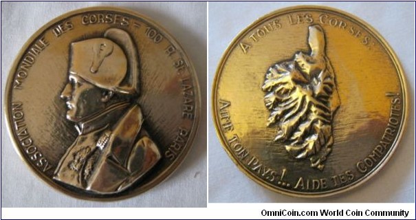 1800 o j France Napoleon I Association Mondiale Des Corses Medal. Gilded Bronze: 50MM./58 gms. 
Obv: Bust of Napoleon I to left. Legend ASSOCIATION MONDIALLE DES CORSES - 100 R.SL.LAZARE PARIS. Rev: Birdeye view Map of Corsica Island. Legend A Tour les Corses:.Aime ton pay!..Aide tes compatriotes!
