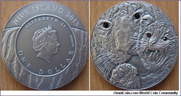 1 Dollar - Family tigers - 31.1 g Ag .999 antique finish (with Swarovski crystals) - mintage 999 pcs only