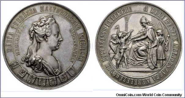 1879 Austria Habsburg Maria Theresa 1740-1780 100th Anniversary of the Reunification of the Southern Parts of the Country with Hungary Medal by C. Raditzky. Silver: 53MM,/41.43 gms. 
Obv: Bust of Maria Theresa to right, 7 Coat of Arms of reunification countries. Legend MARIA THEREZIA MAGYARORSZAG KIRALYA, MDCCLXXIX - MDCCCLXXIX. Rev:  Enthroned welcomes Serbs Pannonia, Hungray and Wallachia. Legend A DELI RESZEK ANYAORSZAGBA KEBELEZRNEK EVSZAZADOS EMLEKERE. Signed C.RADITZKY.
