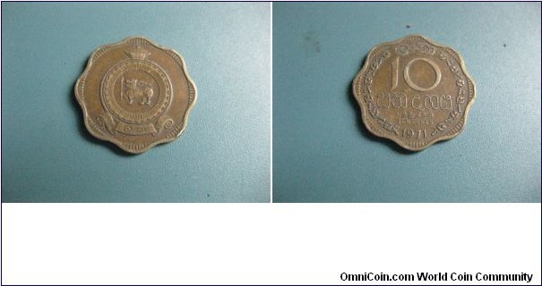 10 Cents 33mm scalloped shape Nickel Brass Genuine Circulated Coin. Very rare no print again.
For More Details Please Contact me on my email.
Thanks