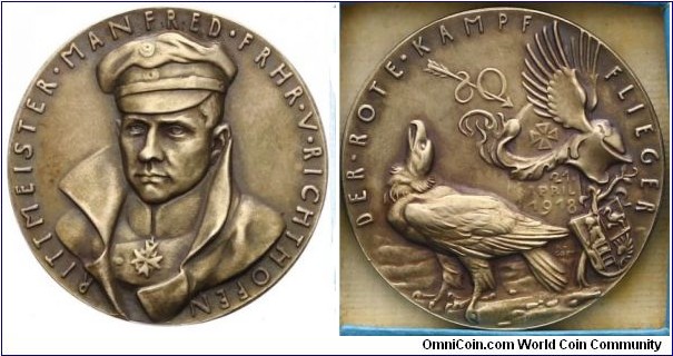 1918 German Munich Dead of Red Baron, Aviator Manfred Freiherr von Richthofen at the Somme by Karl Goetz. Frosted Silver: 36.5MM./19.73 gms.
Obv: Bust of Manfred Fretherr. Legend RITTMEISTER.MANFRED.FRHR.V.RICHTHOFEN. Rev: Eagle and Grave Stone. Legend DER.ROTE.KAMPF FLIEGER.
