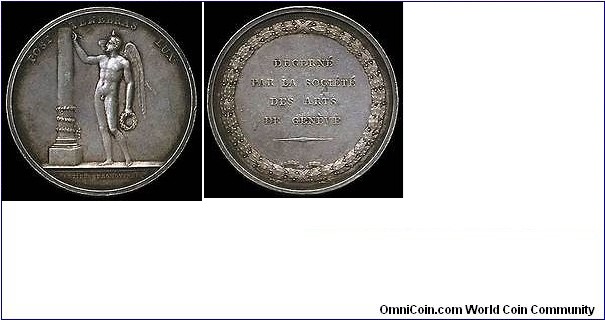 1800 o j Swiss Society of Arts of Geneva Medal. Silver: 48MM./37.85 gms.
Obv: Genius of Arts stands and right hand rised & touching a Pole. Holding a wreath on left hand. Legend POST TENEBRAS LUX. Exergue ARTIBUS PROMOVENDIS. Rev: Wreath arrounding 4 lines legend DECERNE. PAR LA SOCIETE. DES ARTS. DE GENEVE.
