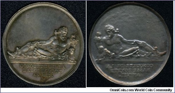 1798 France Conquest of Lower Egypt by Napoleon I One Side Unique Medal by Brenet. Silver: 33MM./2.75 gms. 
Obv: Below Nile  River God lying, leaning on a sphinx, holding cornucopia, exergue CONQUETE DE LA BASSE EGYPT AN VII. Signed BRENET. (One side medal probably unique or trial pattern)
