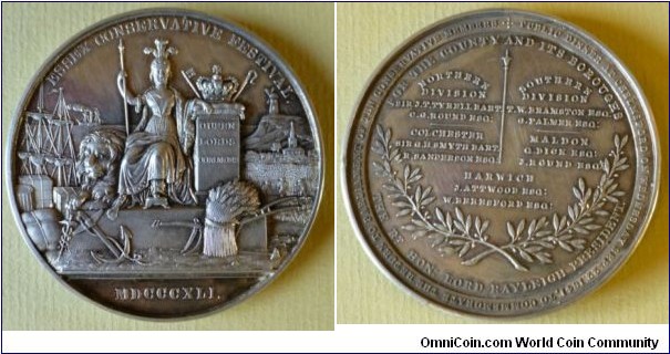 1841 UK Essex Conservative Festival in Chelmsford & return of 10 Members of Parliament Medal.  Silver: 55MM./66.4 gms.
Obv: Seated Britania holding spear & wear plum helmet. Crown on stove on left & lion on right. Dockyard with cargo & anchor. Sail ship & windmill in background. Legend ESSEN CONSERVATIVE FESTIVAL. Exergue MDCCCXLI. Rev: Names of 10 members of Conservative Party with date of dinner held at Chelmsford. 
