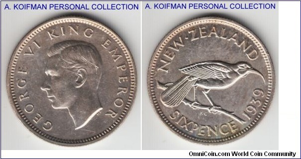 KM-8, 1939 New Zealand 6 pence; silver, reeded edge; appears to be uncirculated or about but with the scratch or a strike-through indentation on King's head.