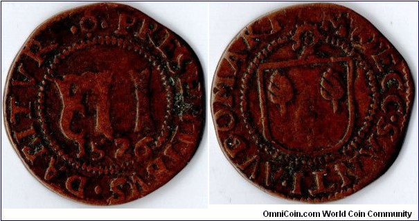 small 24mm copper token (mereau) of 12 deniers minted in 1526 for the cathedral of St Omer (Artois region). obverse denomination and date. Reverse Ecclesiastical arms. 