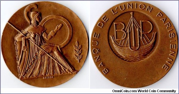 bronze medal struck for the `Banque De L'Union Parisienne'. I'm unsure of the date. The edge mark (cornucopia) indicates it was mintwed after 1880. The bank was inaugurated in 1904 but no detail as to the date this particular medal was actually struck.