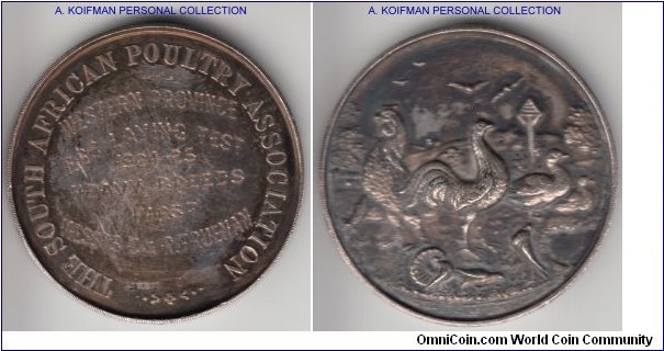 1924-1925 South African Poultry Association first place medal for egg laying test, Western Province, presented to Messrs C & R Trueman; silver, plain edge, high relief; unusual medal, minor scaffing on obverse.