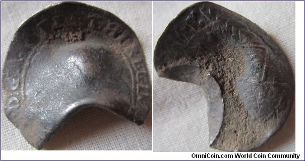 bent and buckled 1582 shilling