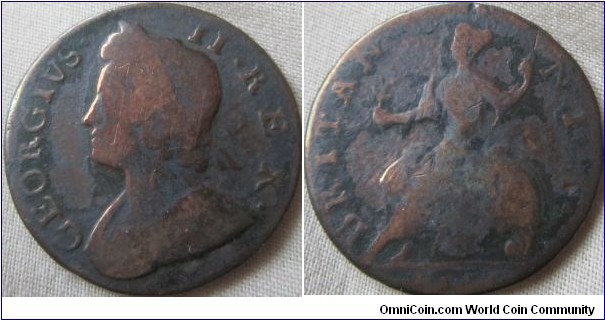 low grde 1754 halfpenny, decent detail but date is hard to read.