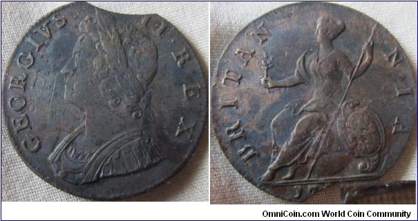 a Beautiful 1753 Halfpenny with planchet clip, top parts of the last 2 numerals are Visable to make this the Date