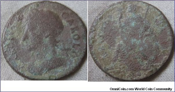 possible a 1674 farthing, general shape of the last nemeral looks like a 4, but could be a slanted 5.