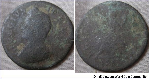 A george II farthing baddly corroded possibly 1730