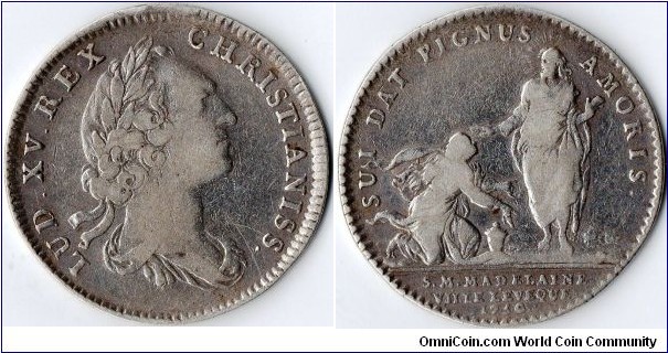 an original silver jeton issued for La Madeleine (church in Paris) in 1750 during the reign of Louis XV. reverse depicts Christ blessing Saint Madeleine. Different bust type(unsigned)to other example I have