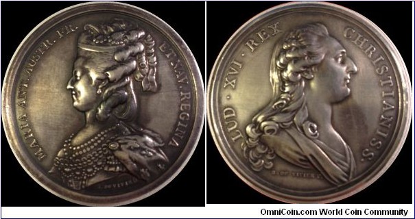 1789 France Louis XVI et de Maire Antoinette Medal by B. Du Vivier. Silver: 42MM./38.8 gm.Obv: Bust of Louis XVI to right. Legend LUD.XVI.REX.CHRISTIANISS. Signed B.DU VIVIER F. Rev: Bust of Marie Antoinette to left. Legend MARIA ANT.AUSTR.FR.ETNAV.REGINA. Signed R. DU VIVIER.
