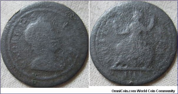 a Geroge I farthing, badly corroded, date more then likely 1719
