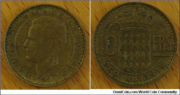 Monaco | 
10 Francs, 1951 | 
20 mm, 3 gr. | 
Aluminium-bronze | 

Obverse: Prince Louis III facing left, date below | 
Lettering: RAINER III PRINCE DE MONACO 1951 | 

Reverse: National Coat of Arms devides denomination | 
Lettering: 10 FRS DEO JUVANTE |