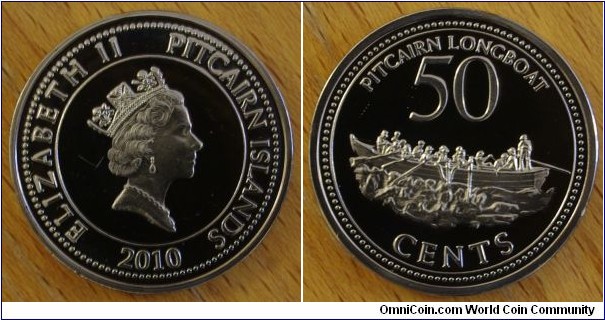 Pitcairn Islands | 
50 Cents, 2010 | 
28 mm, 9.3 gr. | 
Copper-Nickel | 

Obverse: Queen Elizabeth II facing right, date below | 
Lettering: ELIABETH II PITCAIRN ISLANDS 2010 | 

Reverse: Native longboat, denomination below | 
Lettering: PITCAIRN LONGBOAT 50 CENTS |
