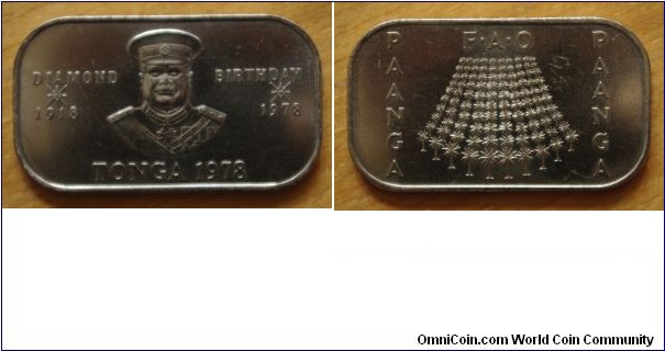 Tonga | 
1 Paʻanga, 1978 – FAO | 
48 mm, 16.6 gr. | 
Copper-nickel | 

Obverse: Uniformed bust of King Taufaʻahau Tupou IV, date below | 
Lettering: DIAMOND BIRTHDAY 1918 1978 TONGA 1978 | 

Reverse: 100 Palm trees | 
Lettering: PAANGA F•A•O PAANGA |