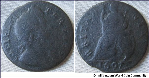1697 farthing, nostops after TERTIVS or BRITANNIA Double Exergue Line, with the lower one a bit faint