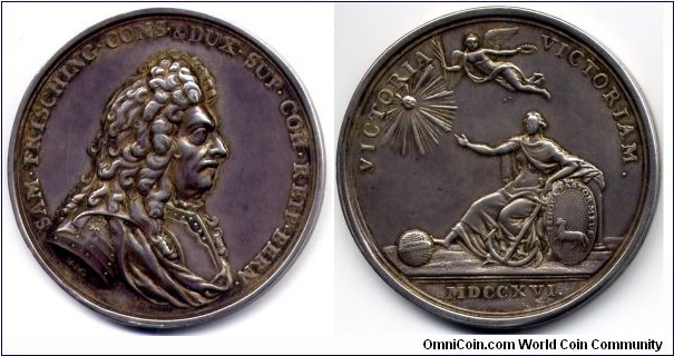 1716 Swiss Bern Medal by H. J. Gessner. Silver: 49MM/42.98 gms. 
Obv: Geharnischle bust with a large wig to right, Legend SAM.FRISCHING.CONS & DUX.SUP.COH.REIP.BERN. Sign H.J.GESSNER. Rev: Flying Victoria & a radiant sun over a seated female with a globe, an anchor & a shield. Legend VICTORIA VICTORIAM. Exergue MDCCXVI. 
