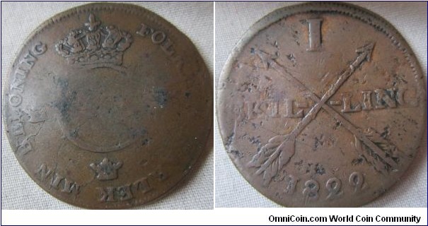 1822 1 skilling, worn grade, odd raised centre on the obverse effecting the striking.