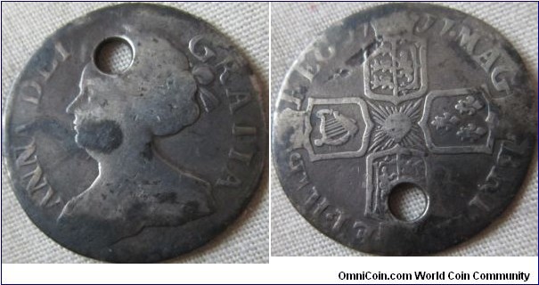 1711 sixpence with small lis, fair grade but holed
