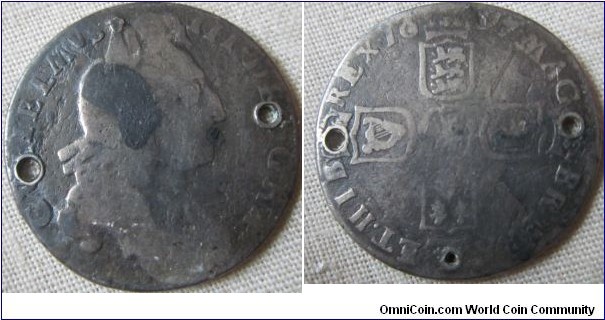 1697 sixpence, first bust, small crowns later harp, sadly holed in a few places