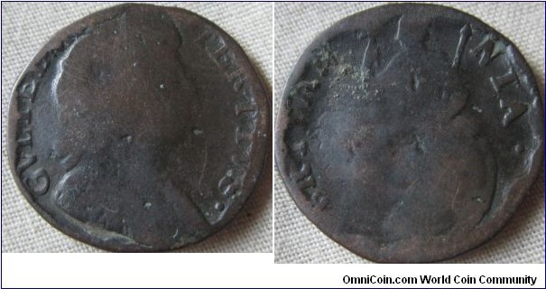 farthing with edges crushed in, no errors so could be any year between 1695 and 1701